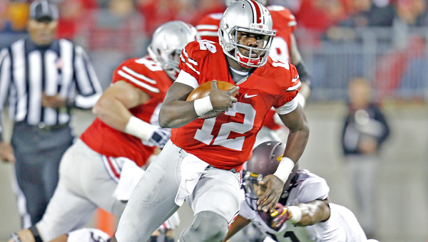 Ohio State Buckeyes’ quarterback Cardale Jones (12) said Wednesday he’ll bypass his senior season and enter the NFL draft. (MCT Direct Photos)