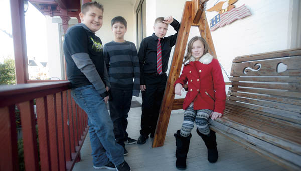 Noah Patterson, third, Merrick Loevenguth, second, Aydan Taylor, first and Laura Hamm, second, pictured left to right, are this year’s historical essay contest winners. The contest was sponsored by the Lawrence County Historical Society. See Sunday’s page 2C to read the winning essays.