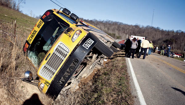 A South Point school bus was on its side along a ditch on State Route 243, around the 10-mile marker Tuesday afternoon. Ten were sent to the hospital.