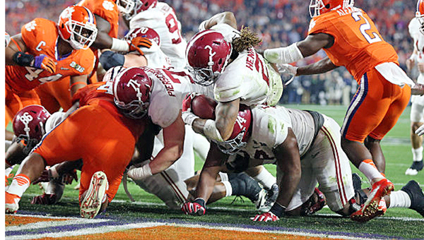 Alabama Crimson Tide running back Derrick Henry (2) scores one of his four touchdowns during Monday’s College Football Playoff championship game. Alabama outlasted Clemson 45-40 to win its fourth national title in seven years. (Photo By Kent Gidley/University of Alabama)