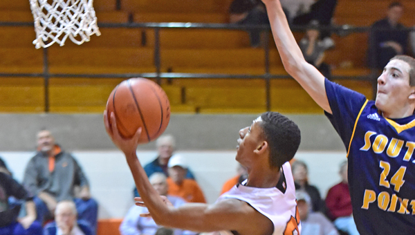 Ironton Fighting Tigers’ Marques Davis (23) drives for a layup as he scores two of his 17 points. Ironton beat South Point 49-32 on Tuesday in an Ohio Valley Conference game. (Kent Sanborn of Southern Ohio Sports Photos)