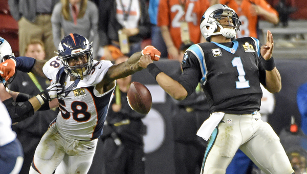 Denver Broncos outside linebacker Von Miller (58) strips the ball from Carolina Panthers quarterback Cam Newton (1) in the fourth quarter in Super Bowl 50 at Levi's Stadium in Santa Clara, Calif., on Sunday. The Broncos won, 24-10. (MCT Direct Photo.com)