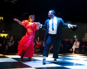 Brenda Martin and Rick Payne perform a salsa dance during the Dancing with Our Stars event Saturday evening.