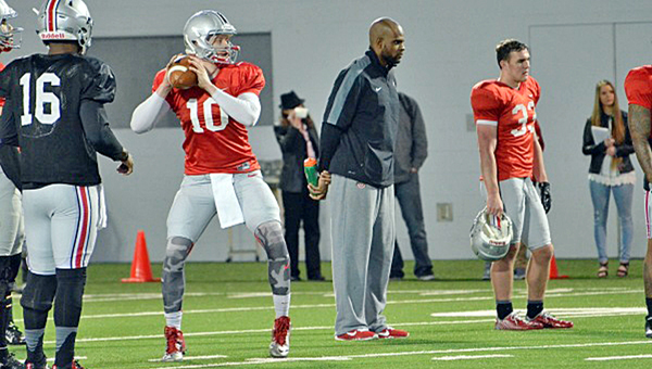Red-shirt freshman quarterback Joe Burrow (10) from Athens High School sets up in spring practice workouts. Burrow will see action during a scrimmage on Saturday. (Photo Courtesy of Ohio State Buckeyes.com)