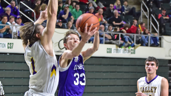 Chesapeake Panthers’ Wesley Stephens (33) drives inside against Lucasville Valley’s Bryce Romanello (1) and scores during a 68-52 Division III district championship game win. (Kent Sanborn of Southern Ohio Sports Photos)