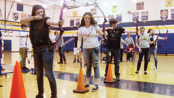 South Point High School students participate in an archery class Friday afternoon. The equipment needed was sponsored though a grant from the Ohio Division of Wildlife.
