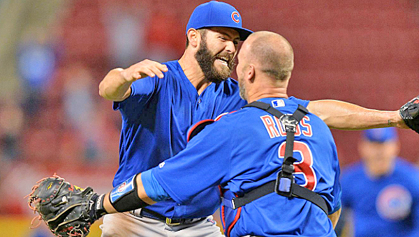 Chicago Cubs’ pitcher Jake Arrieta (left) and catcher David Ross celebrate after Arrieta threw a no-hitter on Thursday against the Cincinnati Reds in a 16-0 rout. (Photo Courtesy of The Cincinnati Reds.com)