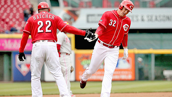 Cincinnati Reds’ outfielder Jay Bruce (32) is congratulated by third base coach Billy Hatcher (22) after hitting the first of two home runs during Thursday’s 10-6 win over the Philadelphia Phillies. (Photo Courtesy of The Cincinnati Reds.com)