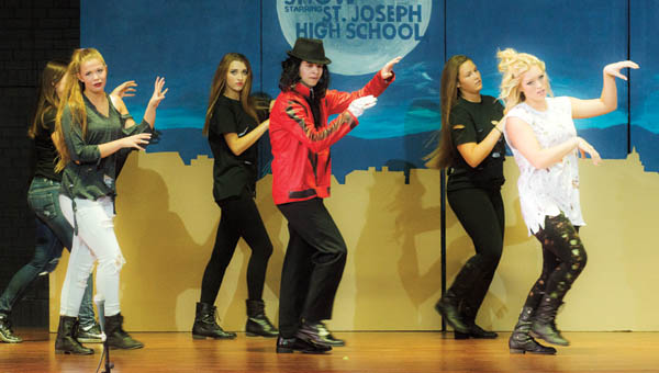 Students perform “Thriller” with favorite characters from Scooby Doo and Ghost Busters as part of the Variety Show event at St. Joseph High School.
