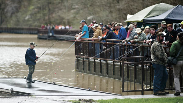 Area residents gather on the boardwalks at Lake Vesuvius for the annual Wheelin’ Sportsmen Fishing event in 2015.