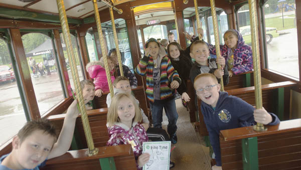 Students tour Huntington’s special trolley bus as part of Vehicle Day at Burlington Elementary School.