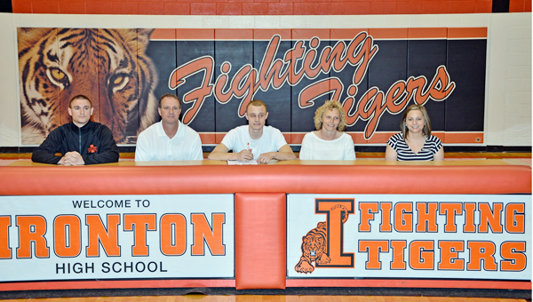 Ironton Fighting Tigers’ senior point guard Phillip Kratzenberg signed a letter-of-intent to play basketball at the University of Rio Grande on Wednesday. Attending the signing ceremony were: from left to right, brother and Ironton assistant coach Chase Kratzenberg, father Robert Kratzenberg, Phillip, mother Kim Kratzenberg and sister Cassie Kratzenberg. (Kent Sanborn of Southern Ohio Sports Photos)