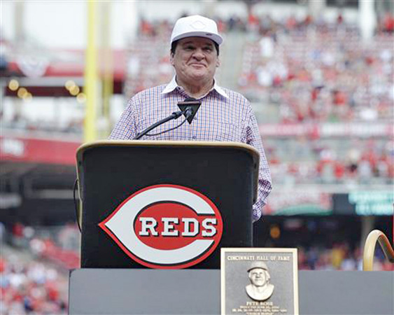 Former Cincinnati Reds’ all-time great Pete Rose speaks to the crowd at Great American Ballpark on Saturday during his Hall of Fame induction ceremonies. (Photo Courtesy of The Cincinnati Reds.com/John Minchillo – AP)