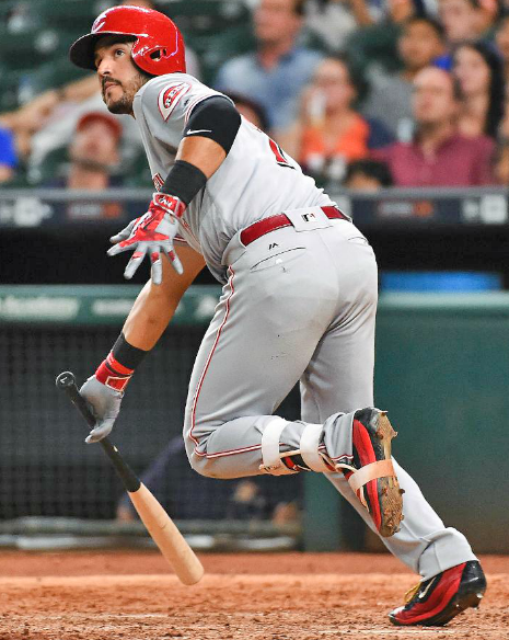 Cincinnati’s Eugenio Suarez hits a go-ahead RBI double in the 11th inning on Friday as the Reds beat the Houston Astros 4-2. (Photo courtesy The Cincinnati Reds.com/Eric Christian Smith — AP)