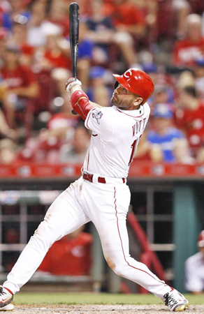 Cincinnati Reds’ first baseman Joey Votto connects for one of his two home runs during Monday’s game. Despite Votto’s efforts the Reds lost to the Chicago Cubs 11-8. (Courtesy of the Cincinnati Reds.com/Joe Robbins - Getty Images)