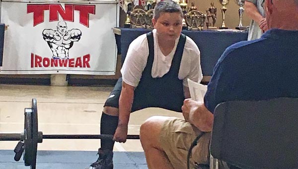 Ironton Middle School student Bryce Maynard prepares to deadlift during the WNPF national championship competition. (Photos Submitted)