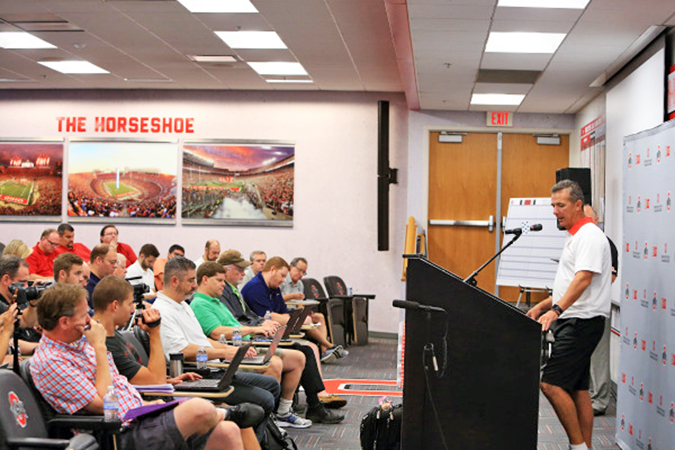 Ohio State Buckeyes’ head football coach Urban Meyer talks with the members of the press during the team’s media day on Sunday. Meyer has had mixed feelings so far with the team’s progress. (Photo Courtesy of The Ohio State Buckeyes.com)