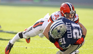 Cleveland Browns' Ed Reynolds takes down Dallas Cowboys running back Ezekiel Elliott during a second quarter run on Sunday at FirstEnergy Stadium in Cleveland. The Cowboys won, 35-10. (Phil Masturzo/Akron Beacon Journal/TNS)