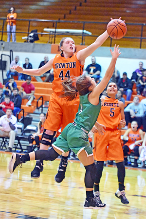 Ironton Lady Fighting Tigers’ Lexie Arden (44) blocks the shot by Fairland Lady Dragons’ Emily Chapman (4) during Monday’s Ohio Valley Conference showdown for first place. Ironton held on for a 47-40 win to tie Fairland for first place in the conference race. (Kent Sanborn of Southern Ohio Sports Photos)