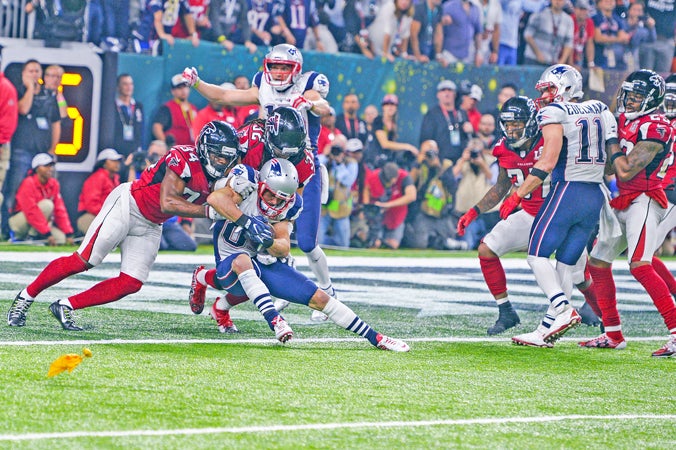 New England Patriots quarterback Tom Brady passes to New England Patriots wide receiver Danny Amendola (80) for a two-point conversion to tie the game during the fourth quarter of Super Bowl LI between the New England Patriots and the Atlanta Falcons on Sunday at NRG Stadium in Houston, Texas. (Anthony Behar/Sipa USA/TNS)