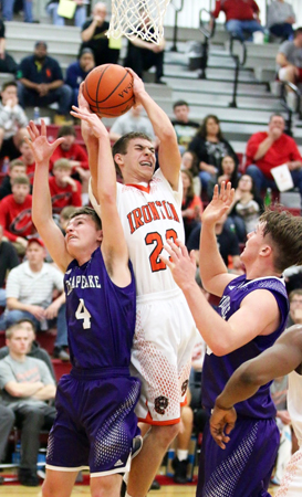 Ironton Fighting Tigers’ Jourdyn Barrow (23) pulls down a rebound. Barrow had 17 points in a 45-28 win over Chesapeake in the Div. III sectional tournament. (Tim Gearhart of Tim’s News & Novelties, Park Ave. in Ironton)
