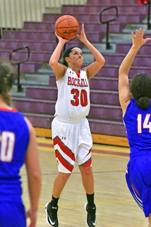 Rock Hill Redwomen guard Jill Hairston pulls up and hits a 3-pointer as she scores 10 points in 54-39 Division III sectional tournament game over Northwest on Wednesday. (Kent Sanborn of Southern Ohio Sports Photos)