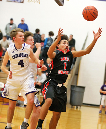 Coal Grove Hornets’ Aaron Music (1) goes after a rebound during Friday’s game against the Chesapeake Panthers. The Hornets got the win, 45-35. (Tim Gearhart of Tim’s News & Novelties, Park Ave. in Ironton)