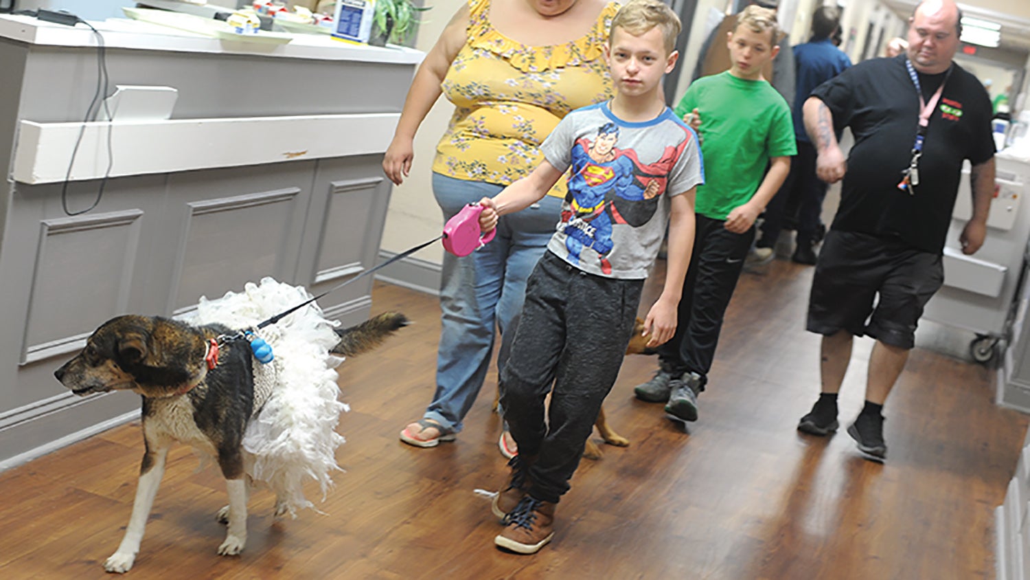 Residents of Harbor Health Care enjoy pets parade with photo gallery.